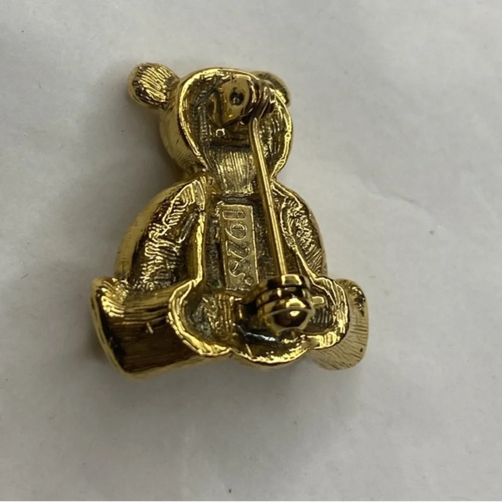 1928 Gold-Tone Teddy Bear Brooch with Amber Heart Crystal